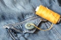 Buttons, Thread and Sewing Needle on Denim. Close-up Royalty Free Stock Photo