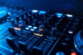 Buttons and volume levels and mixing music on professional Board DJ