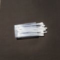 Cotton buds boxes on the black background