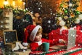 Buy christmas gifts online. Christmas shopping concept. Gifts service. Little genius. Santa little helper. Little boy