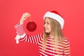 Buy decorations. I love decorating christmas tree. Festive atmosphere christmas day. Girl santa claus costume hold ball Royalty Free Stock Photo