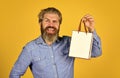 Buy gift. Bearded man hold shopping bags. Retail concept. Happy holidays. Handsome buyer. Seasonal sale. Boost sales