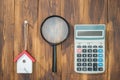 Buy house Mortgage calculations, calculator with Magnifier Royalty Free Stock Photo