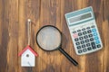 Buy house Mortgage calculations, calculator with Magnifier Royalty Free Stock Photo