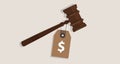Buy justice law price tag dollar sign on hammer bribery corrupted trial judgment concept of auction