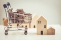 Buy a new home, shopping house sale with money cart trolley for mortgage and loan concept Royalty Free Stock Photo