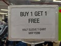 Buy one get one free sign on a Shopping Mall at Jhargram, West Bengal, India