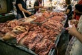 Buy raw pork at market