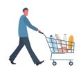 Buyer with shopping cart full of food and drinks Royalty Free Stock Photo