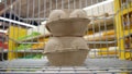 A buyer puts two carton eggs packagings in a shopping cart close-up