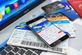 Buying air tickets online via smartphone Royalty Free Stock Photo