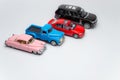 Buying car. Toy cars on white background top view copyspace Royalty Free Stock Photo