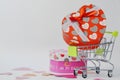Buying gifts for Valentine's Day. Valentine's Day. Trolley with gifts on a white background