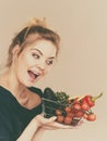 Woman holds shopping basket with vegetables Royalty Free Stock Photo