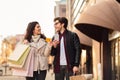 Buying online, Couple with smartphone and credit card near city center Royalty Free Stock Photo