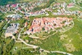 Buzet. Hill town of Buzet surrounded by stone walls in green landscape aerial view Royalty Free Stock Photo