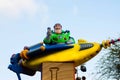 Buzz Lightyear waves and rides on a float in Disneyland Parade