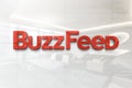 Buzzfeed on glossy office wall realistic texture