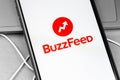BuzzFeed logo on the display smartphone