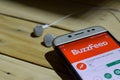 BuzzFeed: News, Tasty Quizzes application on Smartphone screen.