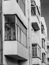 BW facade of avant-garde minimalist house with balconies. Detail of exterior urban architecture