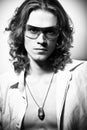 BW portrait of long-haired handsome man Royalty Free Stock Photo