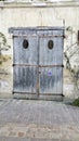 Bygone era faded wooden garage doors