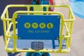 BYKE sign on a blue and yellow bike of bike sharing company BYKE in Frankfurt