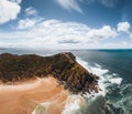 Byron Bay lighthouse high on the rocky headland - the most eastern point of Australian continent facing Pacific ocean in