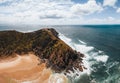 Byron Bay lighthouse high on the rocky headland - the most eastern point of Australian continent facing Pacific ocean in