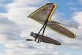 2020-02-09 Byshiv, Ukraine. Hang glider pilot fly on his bright colored wing