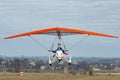 2020-02-09 Byshiv, Ukraine. Motorized hang glider flight Royalty Free Stock Photo
