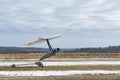 2020-02-09 Byshiv, Ukraine. Towing of a sport hang glider Royalty Free Stock Photo