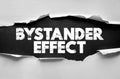 BYSTANDER EFFECT text on ripped paper design. Psychological concept image representing social behavior and group dynamics in Royalty Free Stock Photo