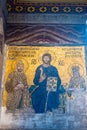 Byzantine mosaic of Jesus Christ on throne with Empress Zoe and Emperor Constantine IX Monomachus in Hagia Sophia Istanbul, Royalty Free Stock Photo