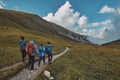 Bzerpinskiy Karniz, a group of hikers walking down a mountain trail Royalty Free Stock Photo