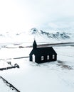 BÃÂºÃÂ°akirkja, SnÃÂ¦fellsnes Peninsula, Iceland, Black church surrounded by snow, frozen nature