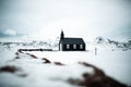 BÃÂºÃÂ°akirkja, SnÃÂ¦fellsnes Peninsula, Iceland, Black church surrounded by snow, frozen nature