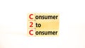 C2C consumer to consumer symbol. Concept words C2C consumer to consumer on wooden blocks on a beautiful white table white Royalty Free Stock Photo