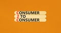 C2C consumer to consumer symbol. Concept words C2C consumer to consumer on wooden sticks on a beautiful orange table orange Royalty Free Stock Photo