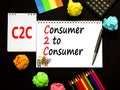 C2C consumer to consumer symbol. Concept words C2C consumer to consumer on white note on a beautiful black background. Calculator Royalty Free Stock Photo