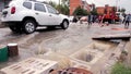 Municipal workers deplete the sewers during the flood.