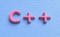 C Plus Programming Language. Development concept. Coding background. Colored pixelized text.