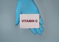 C vitamin text on paper in doctor hand