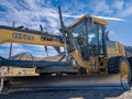 The cab and moldboard on a John Deere 872G Motor Grader near Big Pine, California, USA - November 4, 2022 Royalty Free Stock Photo