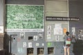 Women`s day 2020. Woman photographing a wall full of feminist messages