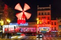 Cabaret Moulin Rouge at night in Paris, France