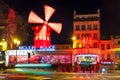 Cabaret Moulin Rouge at night in Paris, France