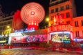 Cabaret Moulin Rouge at night in Paris, France