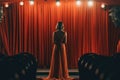 Cabaret Performer In Beautiful Clothes Stands On Stage And Looks Out At The Audience, Rear View. Generative AI Royalty Free Stock Photo